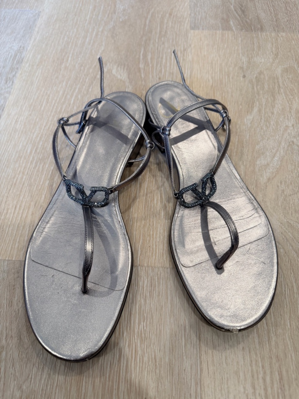 Valentino Silver Metallic Leather T-Strap Sandals with Crystal Logo